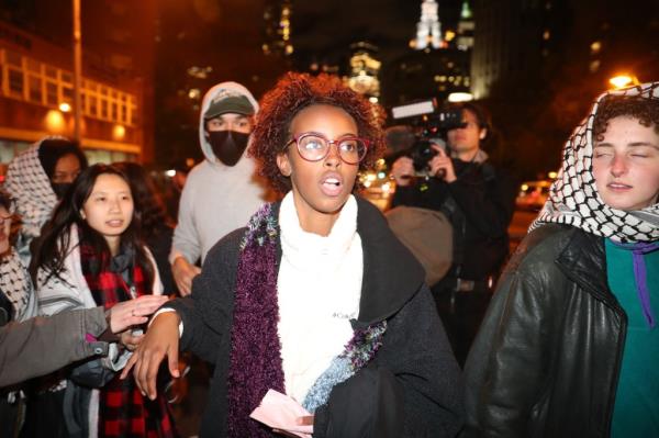 Isra Hirsi, daughter of Co<em></em>ngresswoman Ilhan Omar, exiting custody at Columbia University after arrest at a pro-Palestine protest