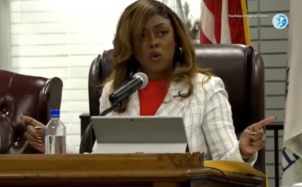 The Dolton Trustee said said former Dolton Chief of Police Robert Collins admitted Tiffany Heynard forced him to target people.   