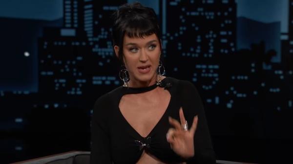 Katy Perry in black dress appearing on 