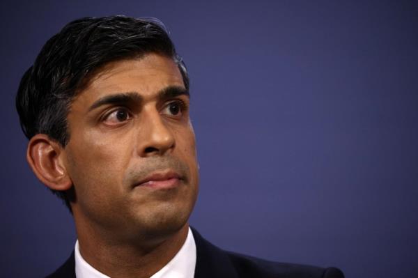 Britain's Prime Minister Rishi Sunak's house was draped by Greenpeace demo<em></em>nstrators protesting his plan to expand oil and gas drilling in the North Sea.