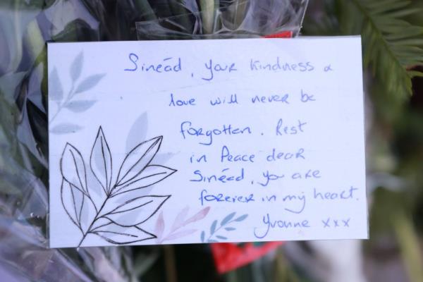 A note from a member of the public left among the flowers and tributes outside Sinead O'Connor's former home in Bray, Co Wicklow