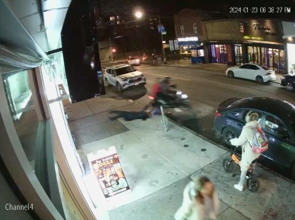 Robbery victim being dragged on street