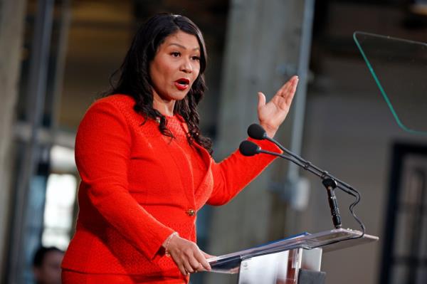 Lo<em></em>ndon Breed speaking at a podium