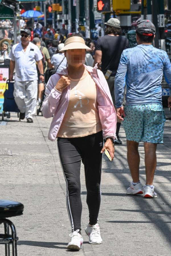 A woman outside a suspected sex shop on Roosevelt who solicited a 