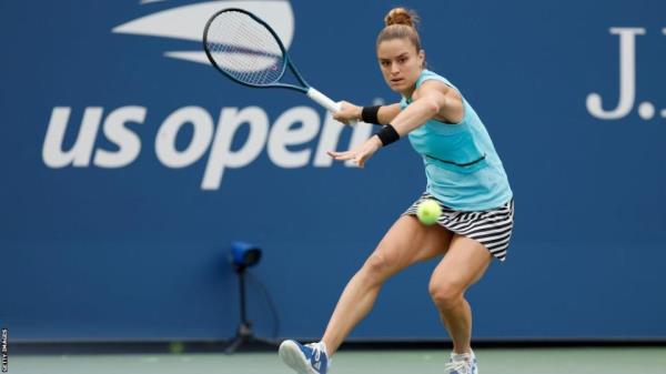 Maria Sakkari swings her racket