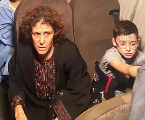 Karen Munder and her son Ohad were carried out of Gaza on Friday.