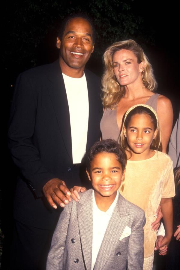 OJ Simpson, seen here with Nicole Brown Simpson and their kids, likely won't be buried next to his murdered ex-wife.