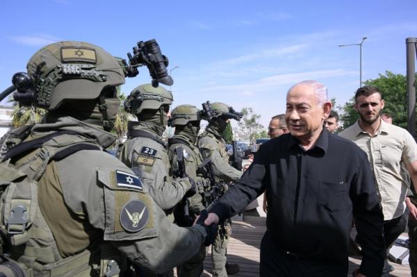 Prime Minister Benjamin Netanyahu visits Israel Police Unit 33 at an undisclosed location on Oct. 30, 2023.  