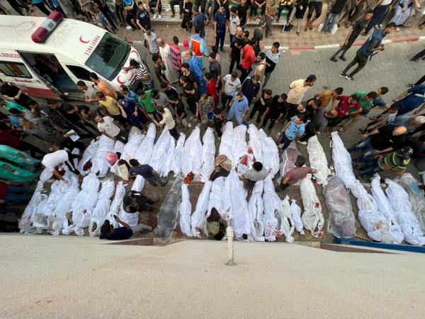 Bodies of Palestinians killed in Israeli strikes on houses in Jabalia refugee camp, lie at a hospital in the northern Gaza Strip, on Oct. 31, 2023. 