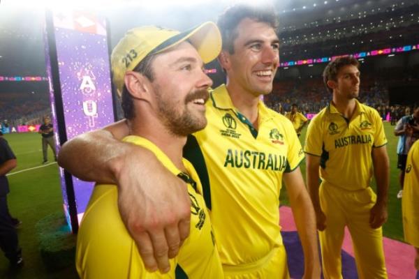 Travis Head and Pat Cummins of Australia celebrate after Australia win the World Cup 