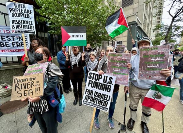 Palestinian-Americans and their supporters protest as the co<em></em>nflict between Israel and the Palestinian militant group Hamas continues, outside the Israeli co<em></em>nsulate in downtown Chicago, U.S., October 8, 2023.