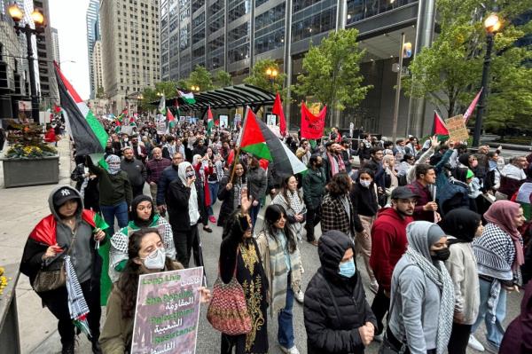 Palestinian-Americans and their supporters march as the co<em></em>nflict between Israel and the Palestinian militant group Hamas continues, in downtown Chicago, U.S., October 8, 2023. 