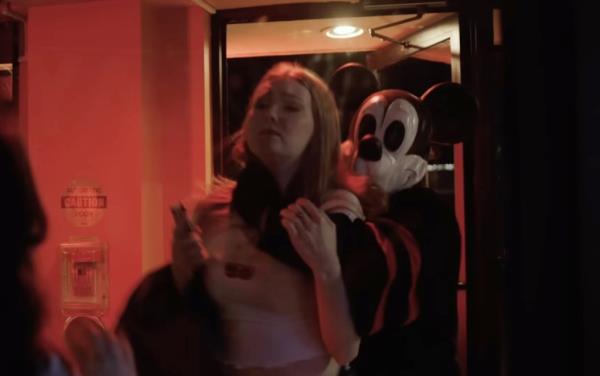 Mickey Mouse strangling a girl. 