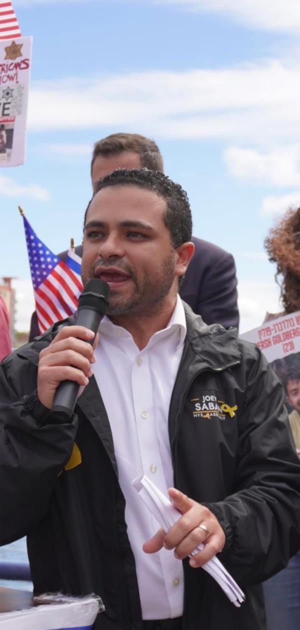 Joey Cohen Saban speaking at a rally