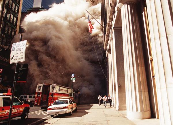 People run for their lives in lower Manhattan after two planes hijacked by terrorists flew into the two towers of the World Trade Center.