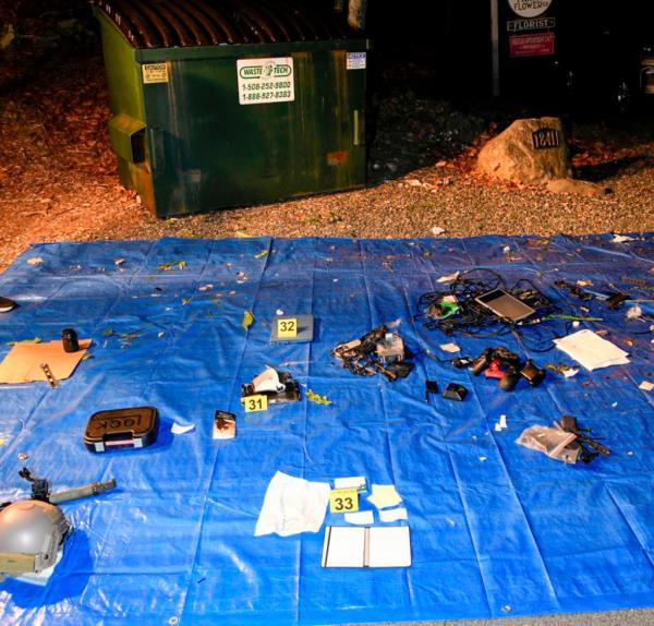 This image co<em></em>ntained in Justice Department motion for co<em></em>ntinued pretrial detention of Jack Teixeira, shows electro<em></em>nic items recovered from a dumpster at his mother and stepfather's home in North Dighton, Mass. 