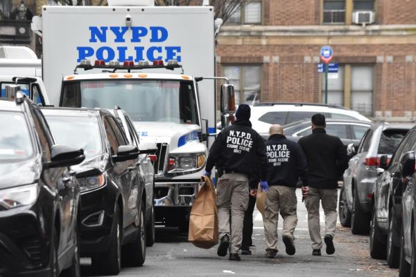 Police walking down the street. 