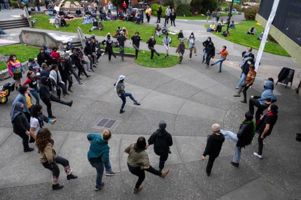 Anti-Israel protesters dancing in a circle at Cal Poly Humboldt on April 23, 2024.