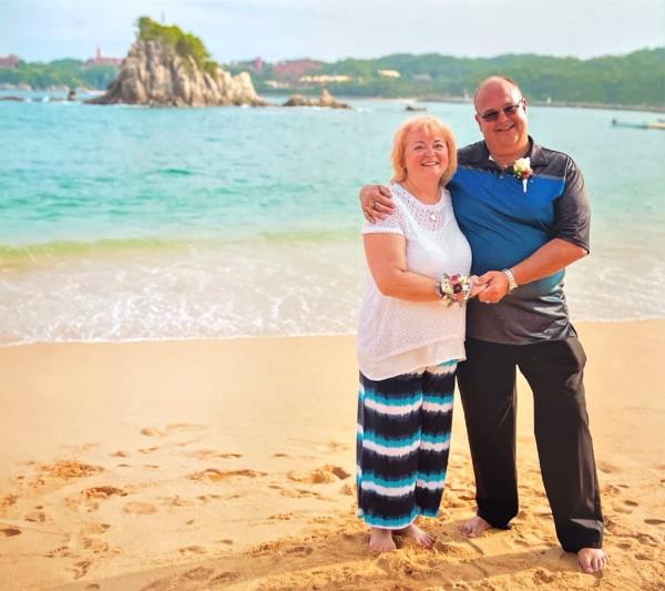 Simeon and his wife Laurie at the beach. 