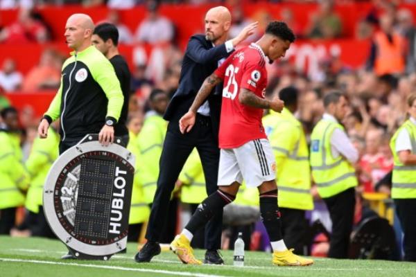 Manchester United boss Erik ten Hag and Jadon Sancho