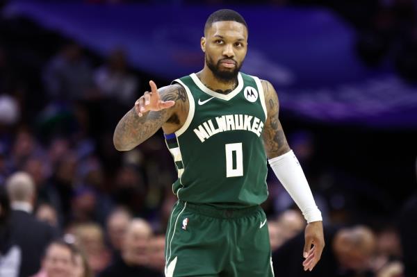 Damian Lillard #0 of the Milwaukee Bucks reacts during the fourth quarter against the Philadelphia 76ers at the Wells Fargo Center on February 25, 2024 in Philadelphia, Pennsylvania.  