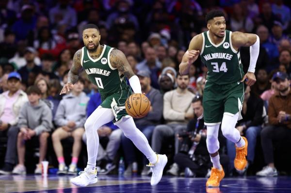 Damian Lillard #0 of the Milwaukee Bucks dribbles during the third quarter against the Philadelphia 76ers at the Wells Fargo Center on February 25, 2024 in Philadelphia, Pennsylvania. 