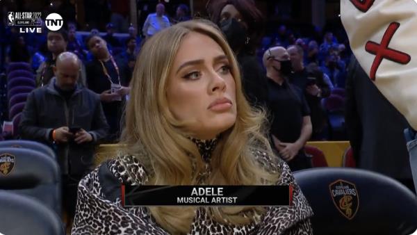 Adele has explained why she looked visibly annoyed in a viral meme from an NBA game two years ago.