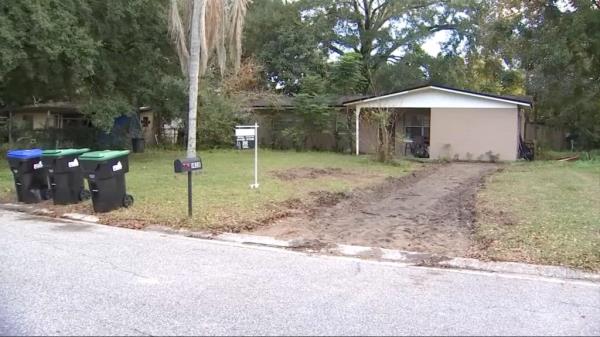 The thief left a muddy dirt strip wher<em></em>e the driveway o<em></em>nce was.