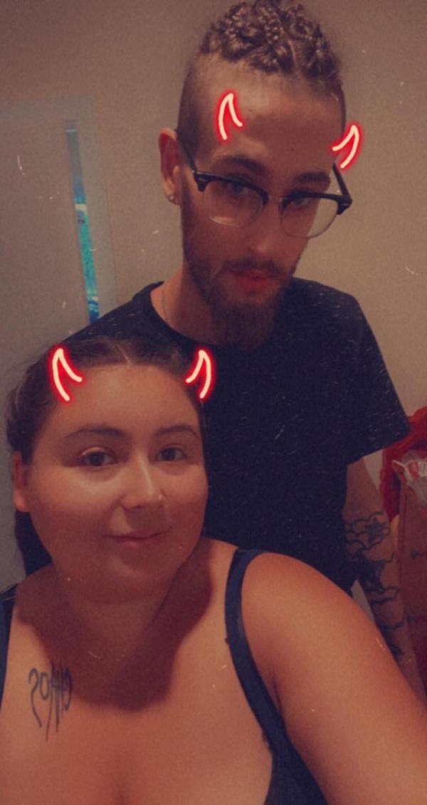 Brianna Welsh and boyfriend Brendon Vozzella in a selfie with devil's ears on their heads.