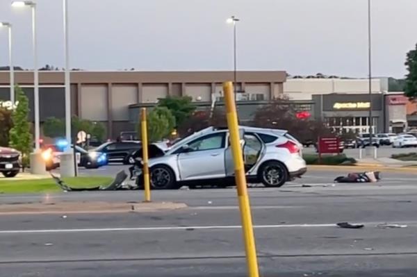 The Ford Focus Flores was riding in was struck by a state trooper as she tried to cross a parkway into a mall