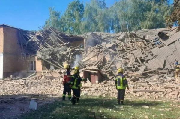 Rescuers work at the site of a Russian drone strike, amid Russia's attack on Ukraine, in Romny in Sumy region, Ukraine on Aug. 23, 2023.