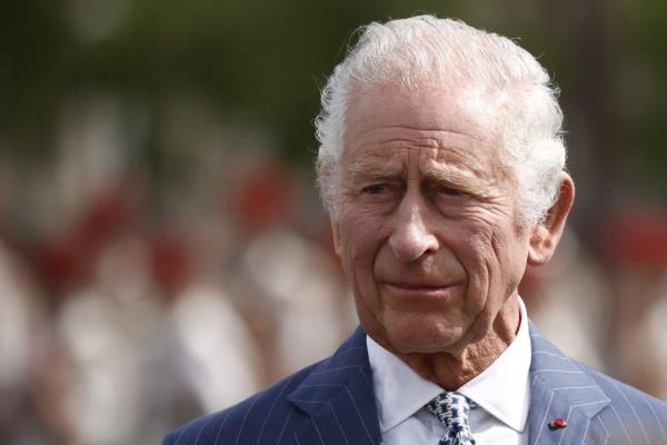 King Charles III at a ceremony in Paris, announcing his cancer diagnosis.