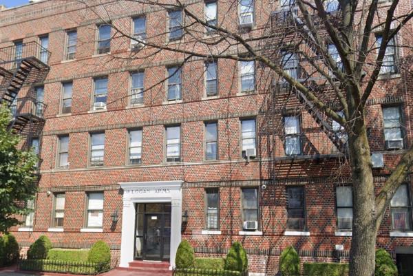 A red brick apartment building on  Logan Street in the Bronx, wher<em></em>e a man and woman were found shot dead Friday night.