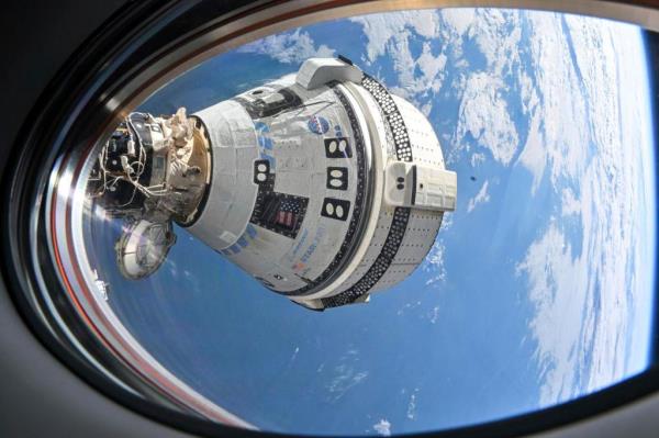 This photo provided by NASA shows Boeing's Starliner spacecraft which launched astro<em></em>nauts Butch Wilmore and Suni Williams to the Internatio<em></em>nal Space Station docked to the Harmony module's forward port on July 3, 2024