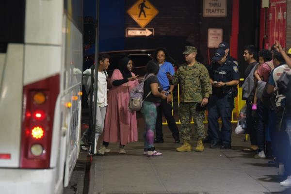 A bus of migrants from Texas arriving at the Port Authority in Manhattan on October 4, 2023.