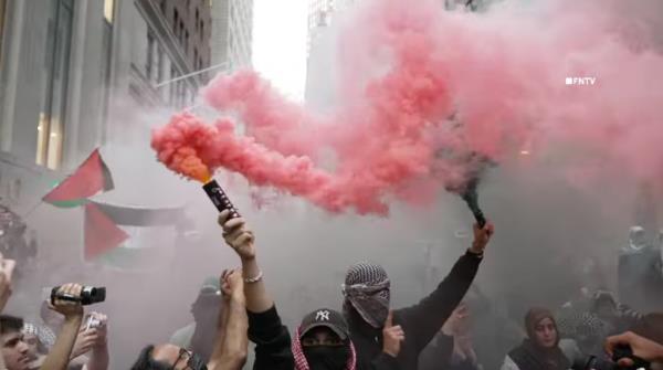 Palestine protesters are marching and rallying on Wall Street in Lower Manhattan