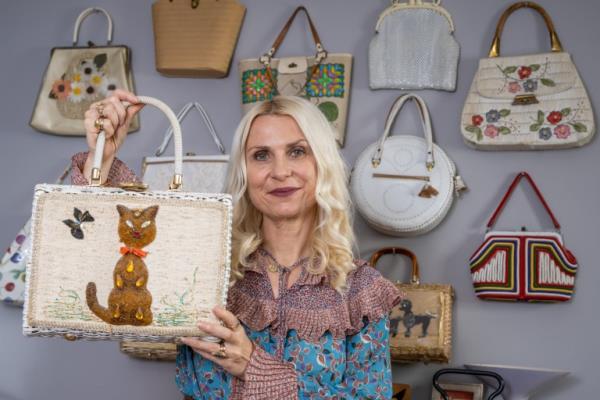 Metro Kate Beavis from Bedford with her collection of vintage bags. July 27 2023