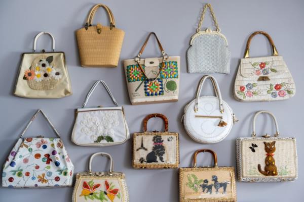 Metro Kate Beavis from Bedford with her collection of vintage bags. July 27 2023