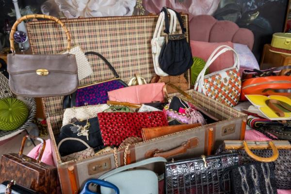 Metro Kate Beavis from Bedford with her collection of vintage bags. July 27 2023