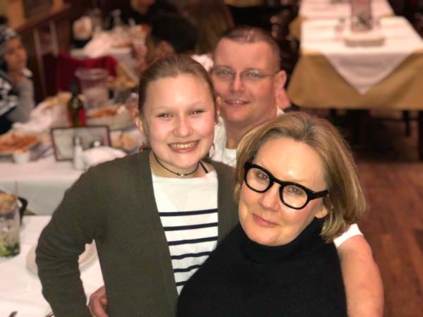 Amellia, Margaret and Richard at a restaurant. 