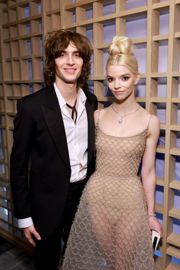 Malcolm McRae and Anya Taylor-Joy posing at the 28th Annual Critics Choice Awards in Los Angeles, California.