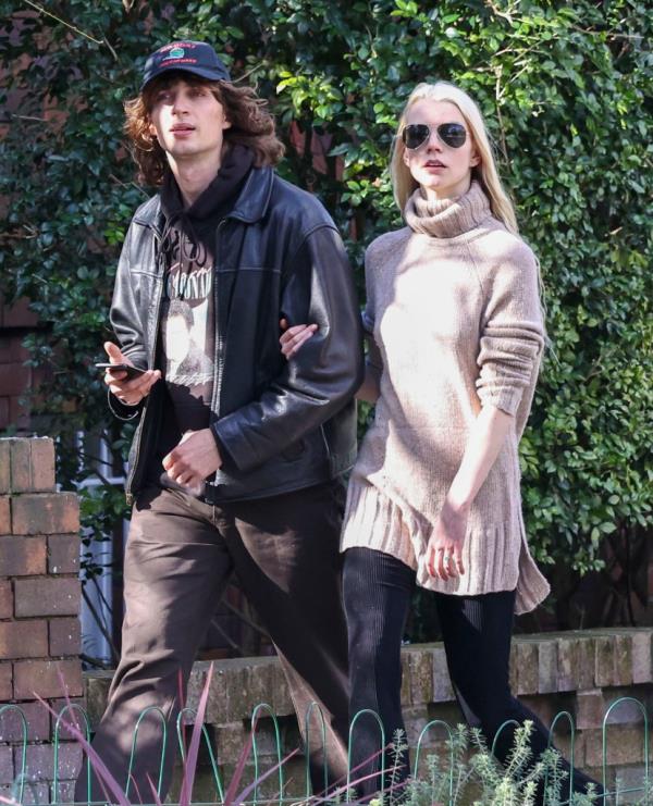 Actress Anya Taylor-Joy and boyfriend Malcolm McRae strolling in Paddington, Sydney, with Taylor-Joy showing an engagement ring.