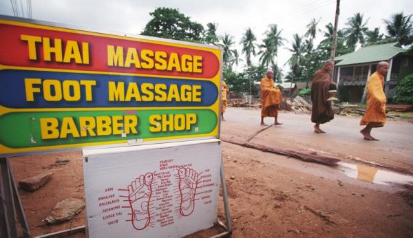 A John Deere subsidiary is alleged to have bribed Thai government officials with trips to massage parlors.