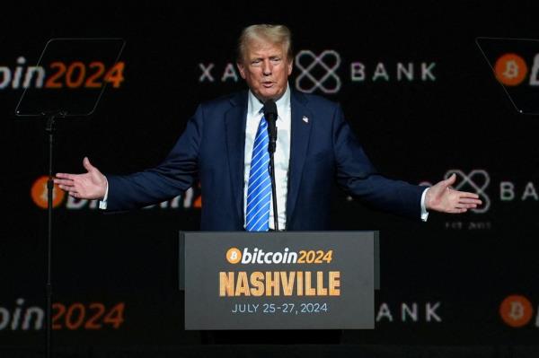 Former U.S. President Do<em></em>nald Trump gesturing at the Bitcoin 2024 event in Nashville, Tennessee.