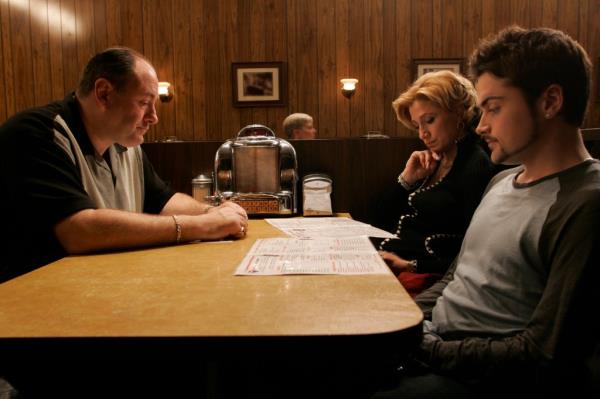 James Gandolfini (Tony Soprano), Edie Falco (Carmela), and Robert Iler (Anthony Jr.) sit at a booth in final episode of 