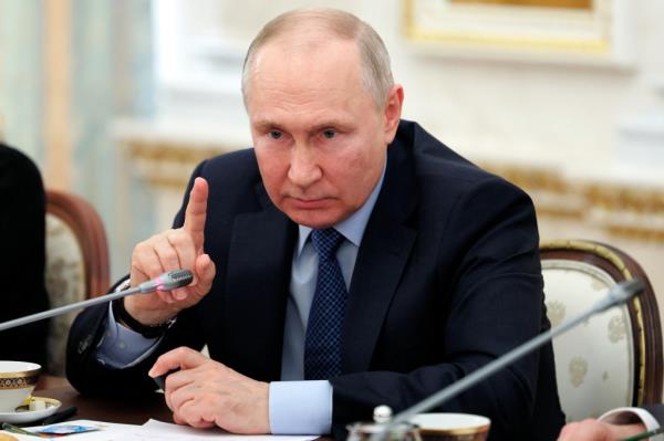 Russian President Vladimir Putin gestures as he speaks during a meeting with Russian war correspo<em></em>ndents who cover a special military operation at the Kremlin in Moscow, Russia, Tuesday, June 13, 2023.