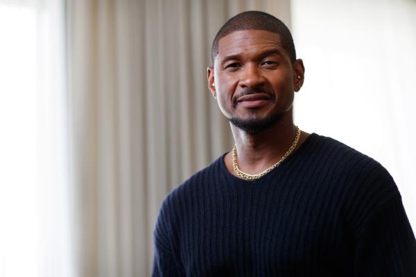 Usher posing in The New York Post's exclusive photo shoot at the New York Edition Hotel on September 4, 2024.