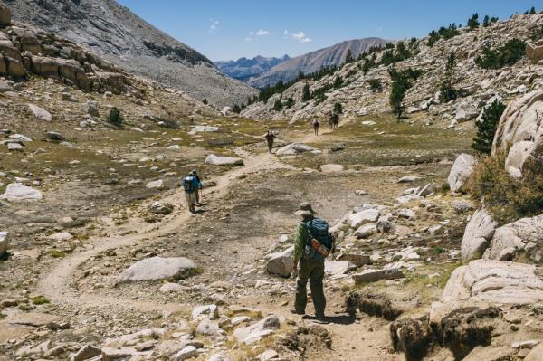 Hikers walk the John Muir Trail below Mt. Whitney near Guitar Lake in the Sierra Nevada Mountains on September 4, 2014