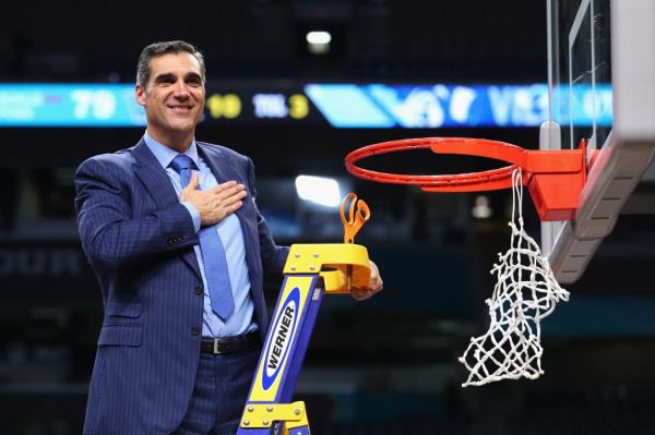 Jay Wright cuts down the net after Villanova's natio<em></em>nal champio<em></em>nship win in 2018.