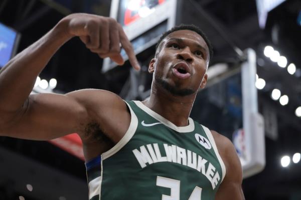 Milwaukee Bucks' Giannis Antetokounmpo reacts after making a shot and being fouled during the first half of an NBA basketball game Saturday, Nov. 2, 2024, in Milwaukee. 